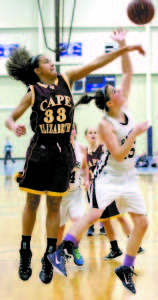 BLOCKED FROM BEHIND â€” Fryeburg Academy's Lexi L'Heureux-Carland drives to the hoop only to have her shot blocked by Cape's Montana Braxton.