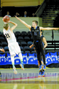 CHALLENGING THE SHOT â€”Â Lake Region senior Quinn Piland contests a shot by Yarmouth's leading scorer Adam LaBrie. (Rivet Photo) LAKE REGION 52 Marcus DeVoe 8-1-24, Nick Hall 2-4-8, Alex Langadas 0-0-0, Jackson Lesure 1-1-4, Quinn Piland 5-0-10, Nate Smith 2-1-5, Tyler Walker 0-1-1, Nicholas Wandishin 0-0-0 3-Pointers: DeVoe (7), Lesure Turnovers: 4-3-1-4, 12 Free Throws: 8-of-15 Field Goals: 18-of-46 Rebounds: 33, Hall 10, Lesure 9, Smith 4, DeVoe 4  Record: 15-5 YARMOUTH 50 Cote Sawyer 1-0-2, Jordan Brown 0-0-0, Charles Cawley 0-0-0, Adam Clark 0-0-0, Cody Cook 8-2-18, Nolan Hagerty 2-0-4, Adam LaBrie 7-2-18, Musseit Mâ€™Bareck 4-0-8 3-Pointers: LaBrie (2) Turnovers: 5-1-1-1, 8 Free Throws: 5-of-12 Field Goals: 21-of-52 Rebounds: 31, Hagerty 11, Sawyer 7, Cook 6 Record: 16-4 BOX SCORE Lake Region 10-14-14-14 â€” 52 Yarmouth 10-14-11-15 â€” 50 