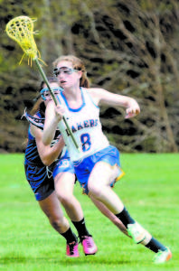 Rachel Shanks makes a move toward the Erskine Academy goal Saturday. (Rivet Photo)